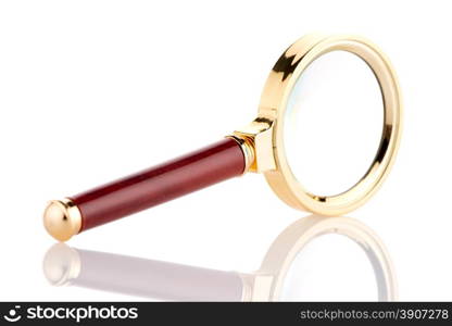 Old magnifying glass isolated over white background.