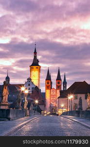 Old Main Bridge, Alte Mainbrucke with statues of saints, Cathedral and City Hall in Old Town of Wurzburg, Franconia, Bavaria, Germany. Wurzburg, Franconia, Northern Bavaria, Germany