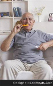 Old man eating ice cream