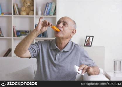 Old man eating ice cream