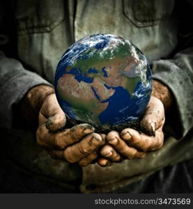 Old man holding the Earth in his hand. Ecology concept