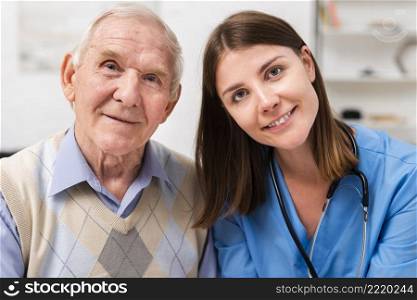 old man nurse looking camera