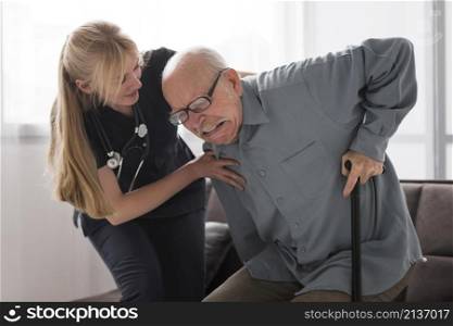 old man pain helped by nurse