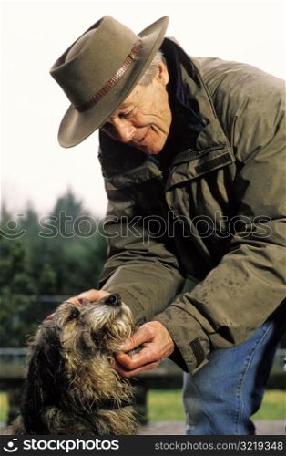 Old Man Talking to a Nice Dog