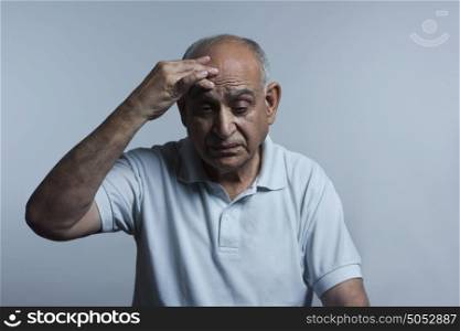 Old man with headache