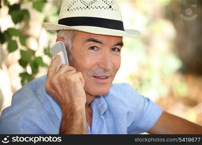 Old man with telephone