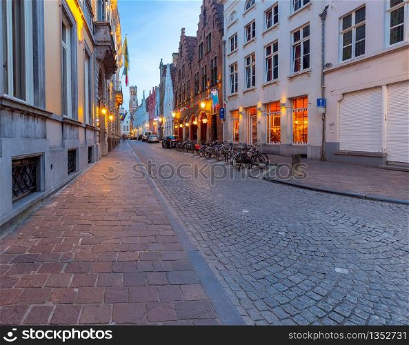 Old medieval street and colorful facades of traditional Belgian houses. Brugge. Belgium.. Brugge. Old medieval street.