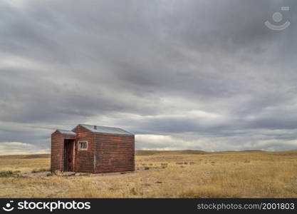 old, metal, rusty shack on a prairie - Soapstone Prairie Natural Area in northern Colorado