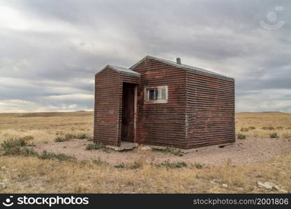 old, metal, rusty shack on a prairie - Soapstone Prairie Natural Area in northern Colorado