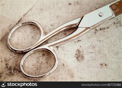 Old metal scissors, intentionally shot in vintage tone.