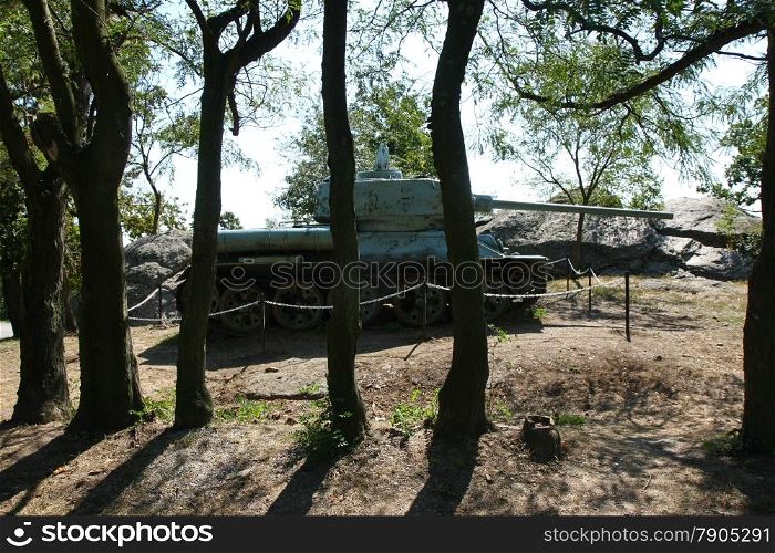 Old military tank as a relic of World War II in the forest near Vrsac in Serbia