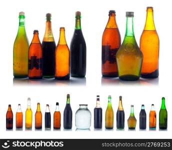 Old multicolored wine bottles with natural dust and dirtiness
