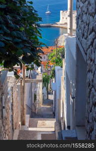 Old narrow medieval street in the historical part of the city. Dubrovnik. Croatia.. Dubrovnik. Old narrow traditional city street.