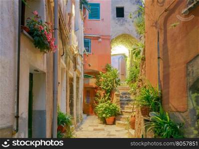 Old, narrow, medieval streets in the Italian village Vernazza at night. Cinque Terre National Park, Liguria, Italy.