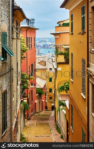 Old narrow street in Genoa city, Italy