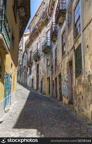 Old Narrow Street in Portuguese City in Summer Time. Old Narrow Street in Portuguese Town