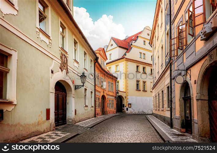Old narrow street of Prague at dawn