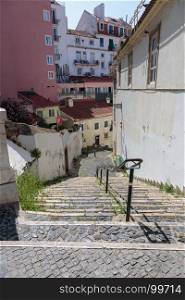 Old Narrow Street with Stairs in Portuguese City