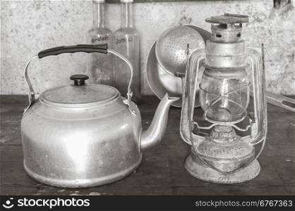 Old objects once: aluminum kettle and old acetylene lamp