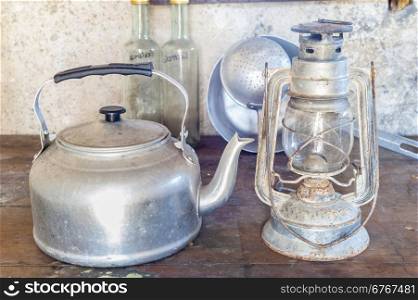 Old objects once: aluminum kettle and old acetylene lamp