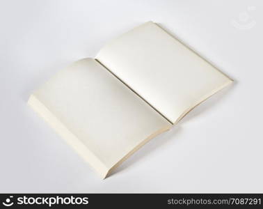 Old open blank book mockup, isolated on grey. Top view. Old open blank book isolated on grey