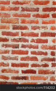 Old orange brick wall texture background. Wallpaper. Brick wall texture background