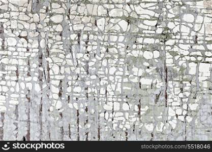 Old painted wood background. Old weathered chipped painted wood as grunge background