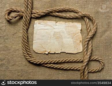old paper and rope on canvas, frame