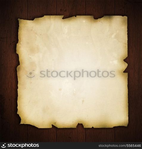 Old paper on a grunge wood background