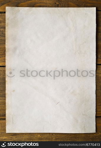 old paper on wooden background