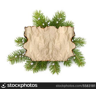 Old parchment paper with copy space on Christmas tree branch background isolated