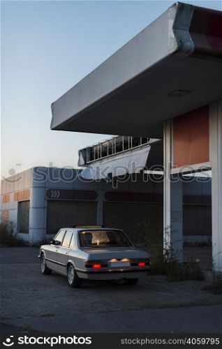 old parked car with backlights