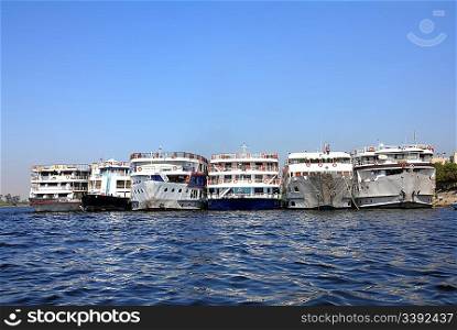 old passenger ships standing in port on Nile