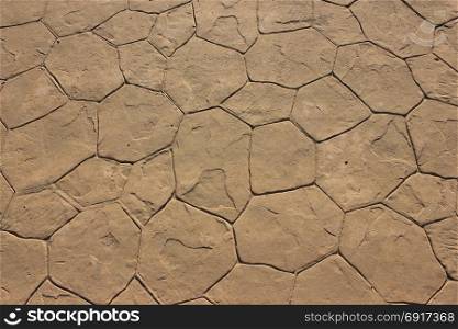 Old pavement tile floor. Surface rough of footpath. Decorative texture background. Old pavement tile floor