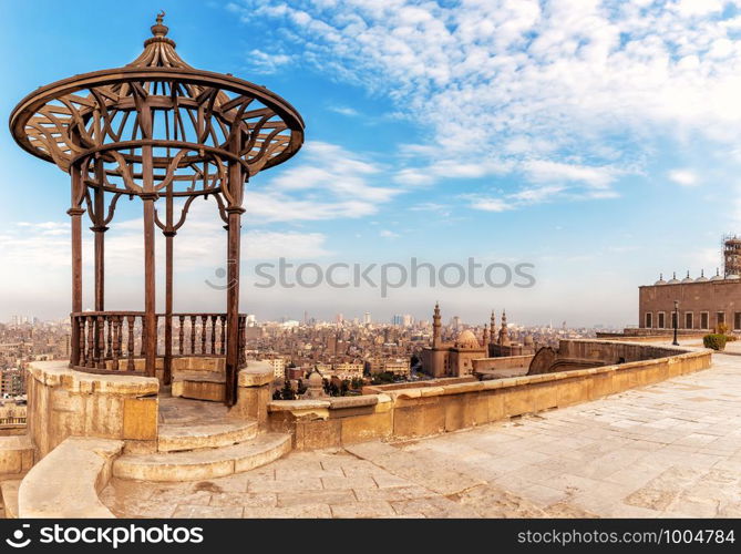 Old pavilion on the Citadel roof and the Mosque-Madrassa of Sultan Hassan on the background, Cairo, Egypt.. Old pavilion on the Citadel roof and the Mosque-Madrassa of Sultan Hassan on the background, Cairo, Egypt