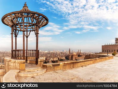 Old pavilion on the Citadel roof and the Mosque-Madrassa of Sultan Hassan on the background, Cairo, Egypt.. Old pavilion on the Citadel roof and the Mosque-Madrassa of Sultan Hassan on the background, Cairo, Egypt