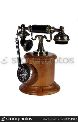 Old phone from a wood and metal on the white background. (isolated)