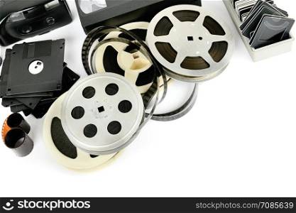 Old photo and video equipment isolated on white background. Retro storage media. Free space for text.