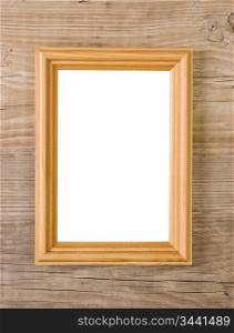 old picture frame isolated on a wooden background