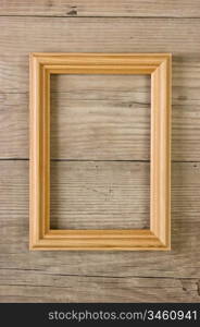 old picture frame on a wooden background