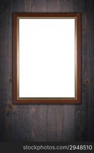 Old picture frame on vintage wood wall.