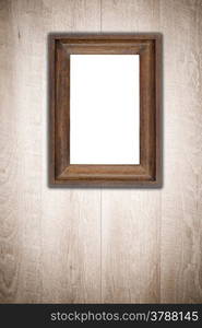 Old picture frame on vintage wood wall.
