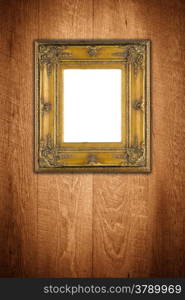 Old picture frame on vintage wood wall.