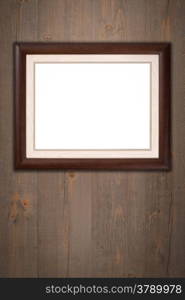 Old picture frame on vintage wood wall.