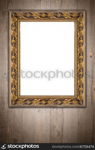 Old picture frame on vintage wood wall.