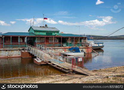 Old pier on the river. Old pier on the river Bank