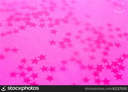 Old pink holiday wallpaper with a stars