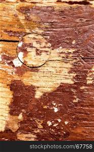 old plank with chipped color remains