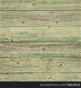 old planks of garden shed with peeling green paint on square image