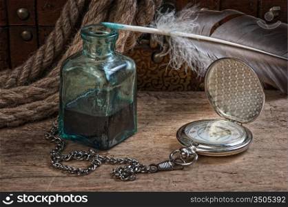 old pocket watch and inkwell, still life